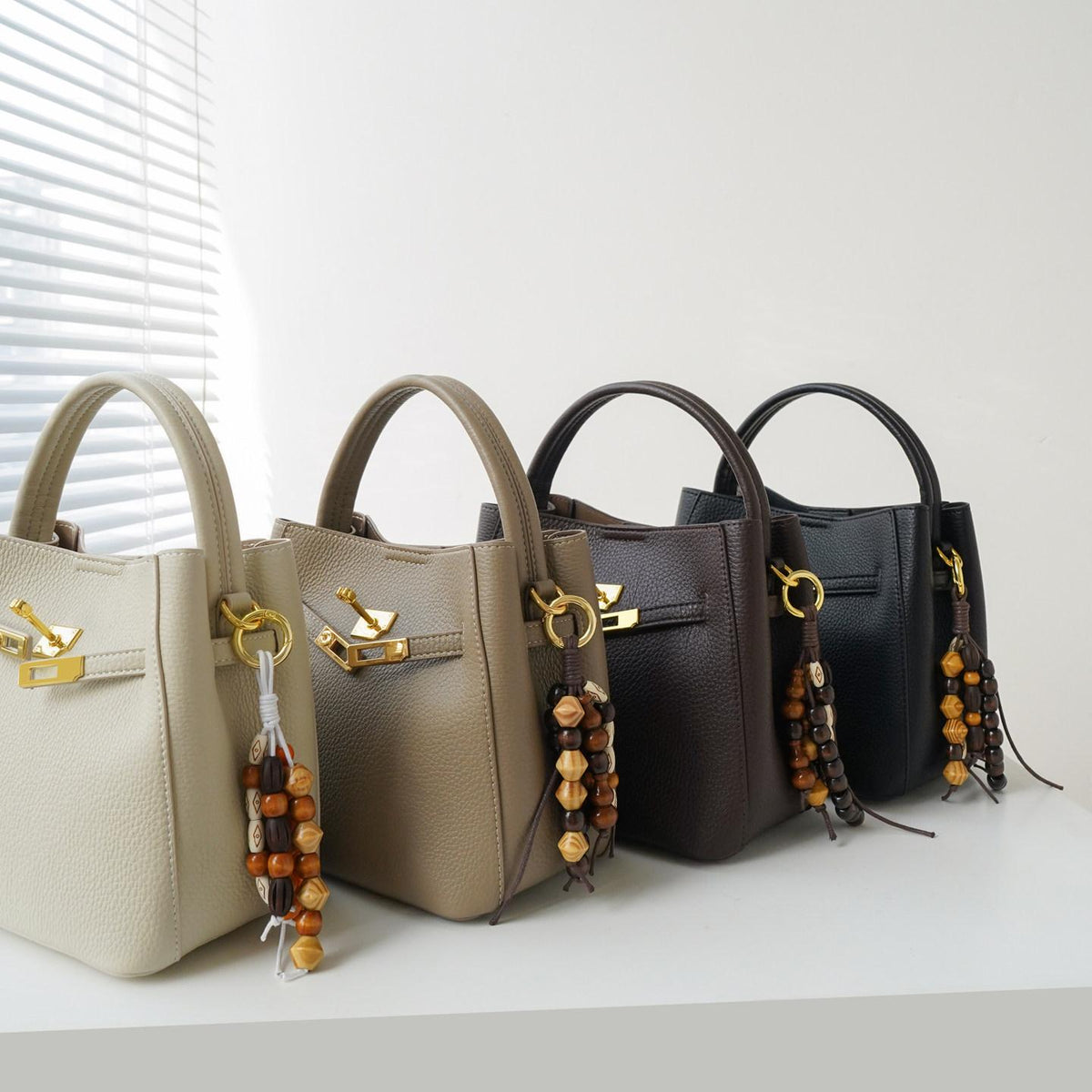 Avenza Belle Pebbled Leather Bucket Bag #Taupe #Brown #White #Black